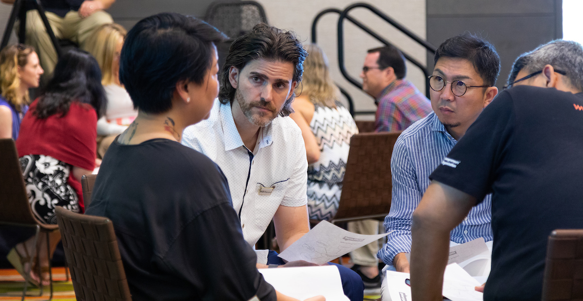 EO members in conversation reflecting the culture of the organization