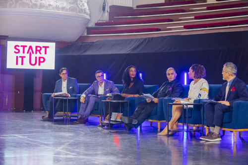 Six EO member judges discuss the GSEA Global Finals during the filming of Start It Up.