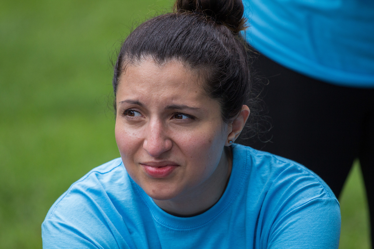 Close-up of a young woman's face with a worried or anxious look.